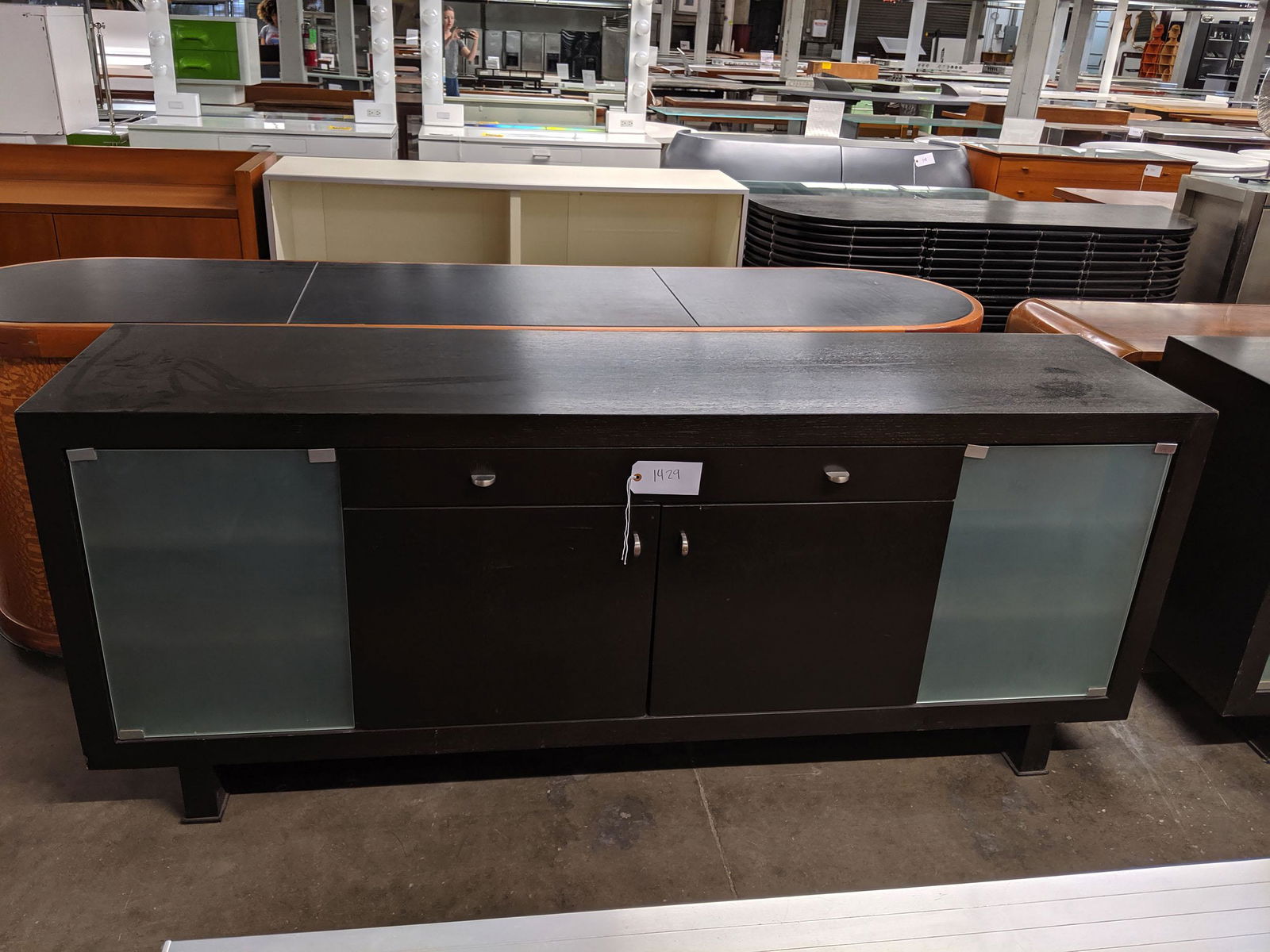 Modern Credenzas: Pair of modern dark wood credenzas.