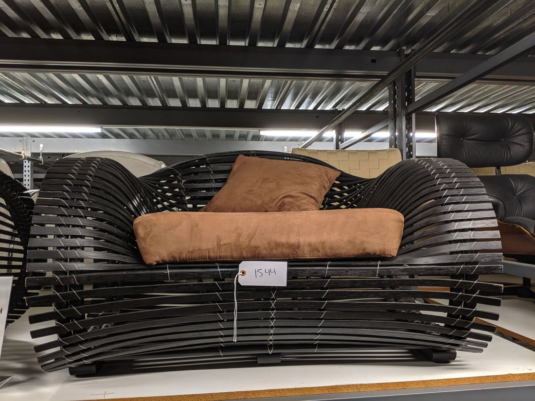Rattan Seating Set: Rattan seating set with one sofa and two armchairs.
