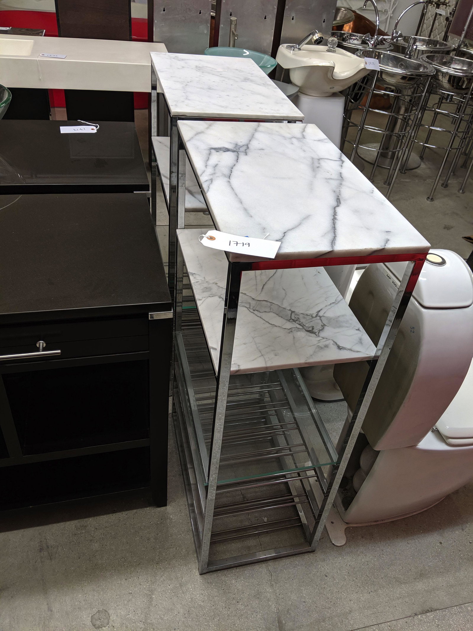 Marble Topped Etageres: Pair of marble topped etageres.