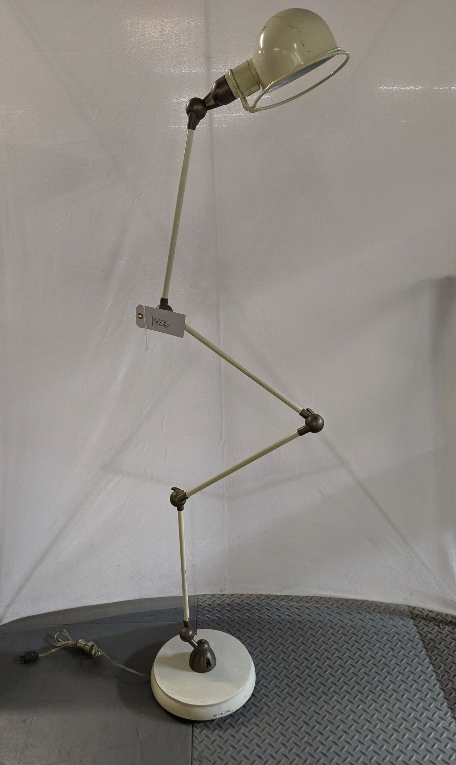 Jielde Style Floor Lamp: Jielde style cream articulating floor lamp.