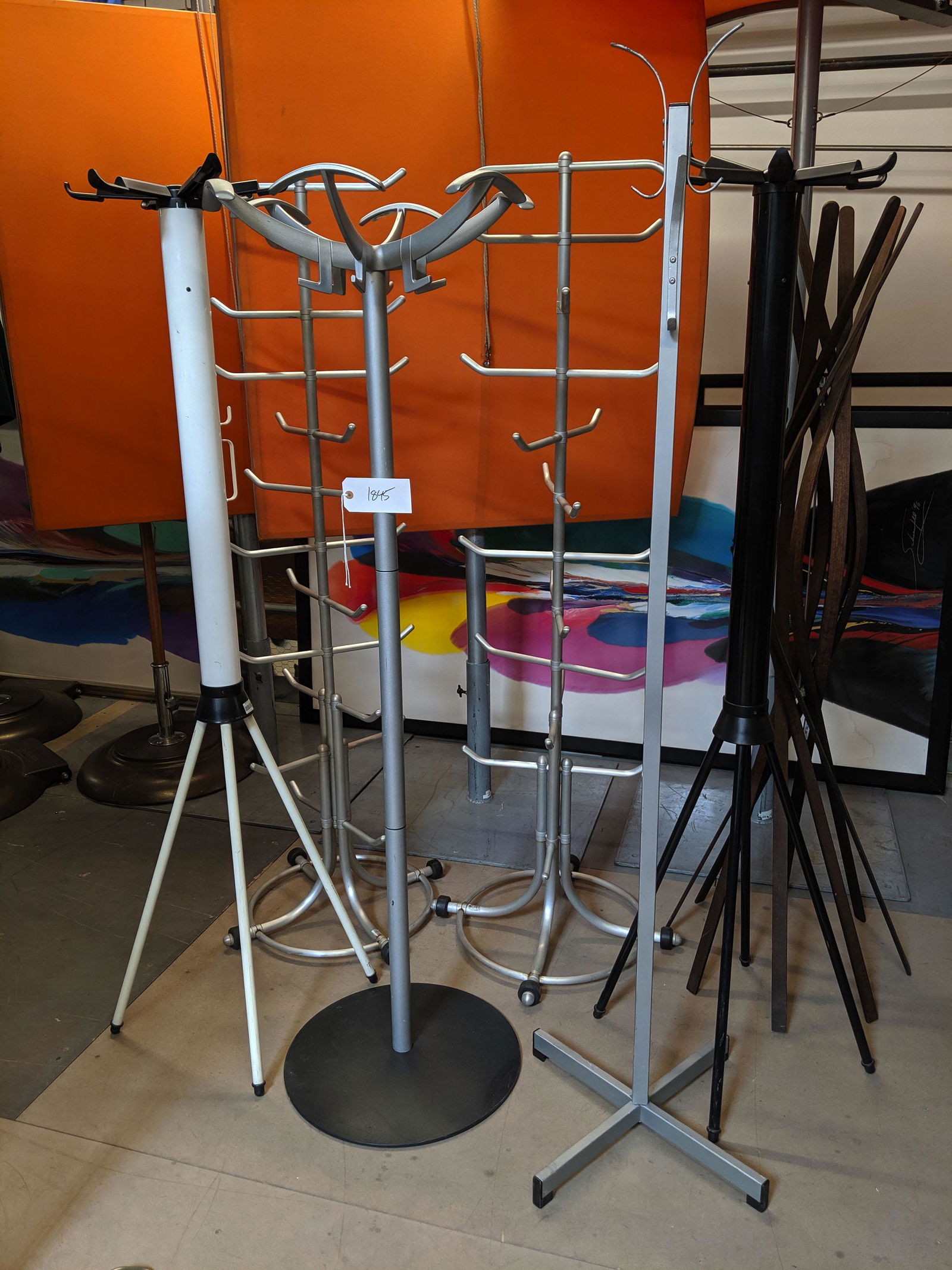 Assorted Coat Racks: Assorted coat racks.