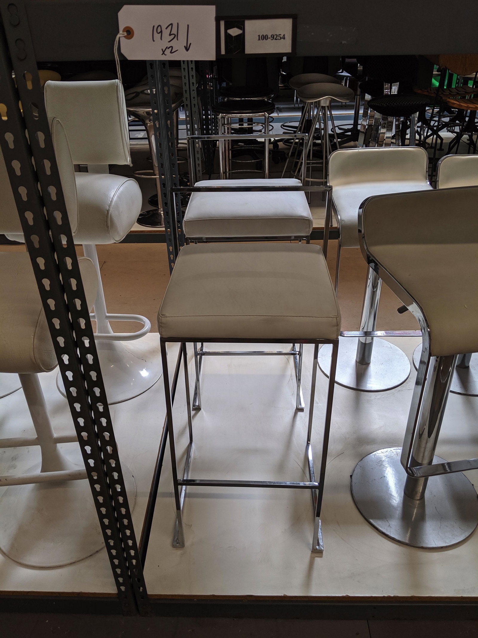 Minimal bar stools: Pair of minimal bar stools.