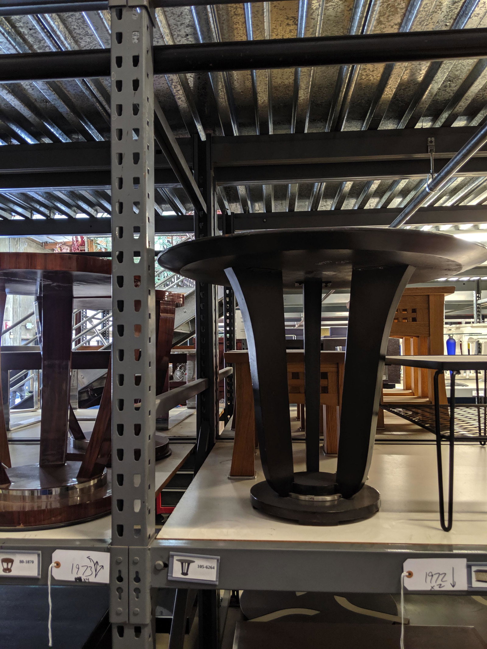 Side Tables: Four side tables of various designs.