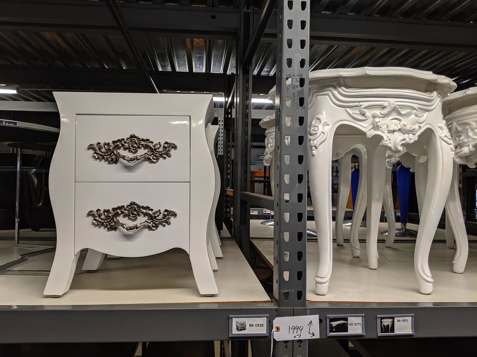 Ornate Side Tables: Seven ornate side tables.