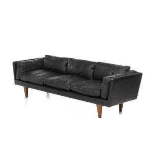 Illum Wikkelso Leather V-11 Sofa: Three-seat leather and walnut sofa, model V-11, by Illum Wikkelso for Holger Christiansen, Denmark, ca. 1965