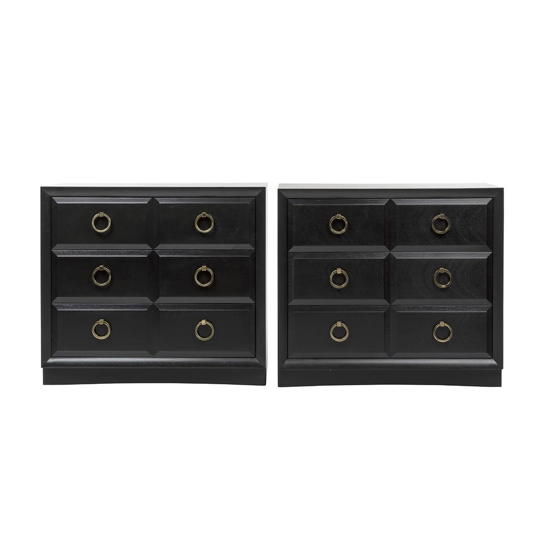 T. H. Robsjohn-Gibbings Dressers (2): Pair of mahogany three-drawer dressers with circular brass handles by T. H. Robsjohn-Gibbings for Widdicomb, 1950s. Interior of drawer with manufacturer's label.