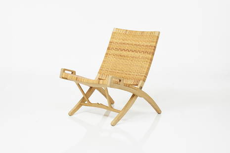 Hans Wegner JH512 Folding Chair: Oak and cane folding low chair by Hans Wegner, manufactured by PP Mobler, Denmark, 1998. Branded manufacturer's mark to base.