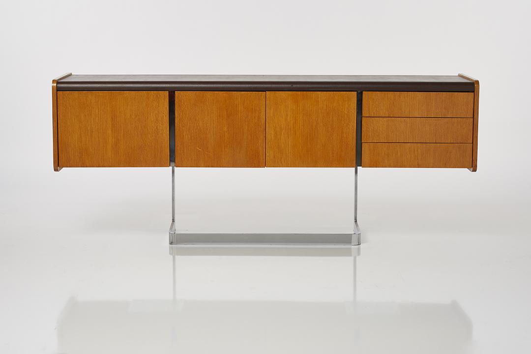 Ste Marie and Laurent Credenza: Cantilevered oak credenza with brown leather top and chrome base by Ste Marie and Laurent, Canada, 1970s. Interior of drawer with manufacturer's label.
