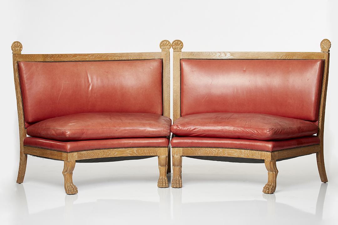 Oak Curved Settees (2): Cerused oak and leather settees with carved paw feet and shell finials, France, 1950s.