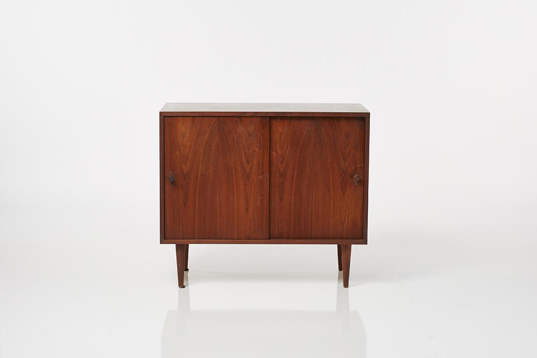 Modernist Two Door Cabinet: Walnut cabinet with two sliding doors, 1960s.