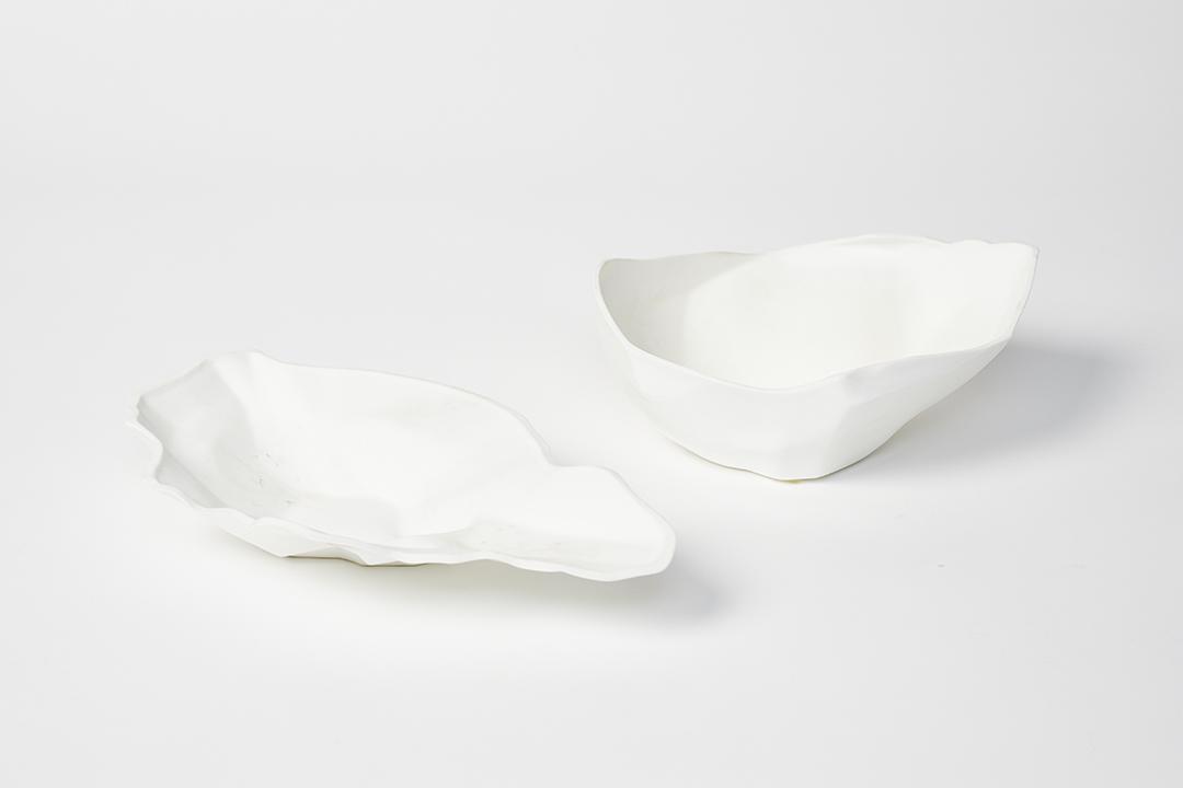 Frank Gehry Rock Bowls (2): Two bone china Rock bowls by Frank Gehry for Tiffany & Co., Ireland, ca. 2006. Bowl: 3.5 x 9 x 7.25 in. Property from the Collection of the Museum of California Design.
