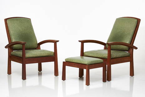 Thomas Moser Chairs and Ottoman (3): Pair of reclining cherry armchairs and ottoman with green leather upholstery by Thomas Moser, 2006-2008. Undersides with branded lining, signature and date. Ottoman: 15 x 23 x 17 in.