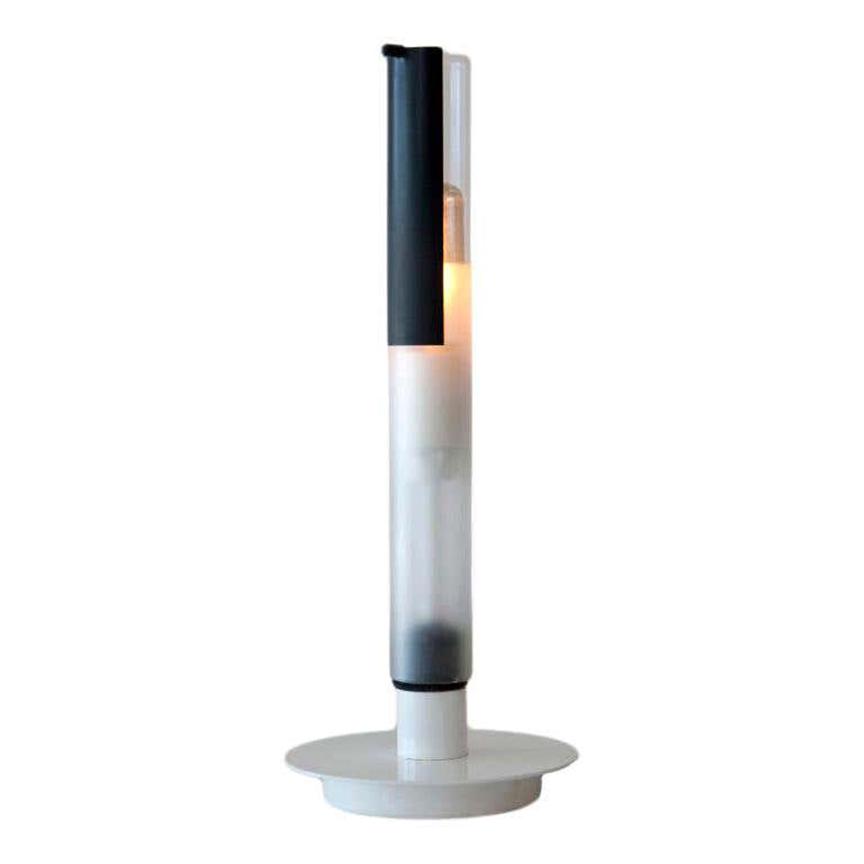 Minimalist Table Lamp: Minimalist painted metal table lamp with adjustable frosted glass shade, 1950s.