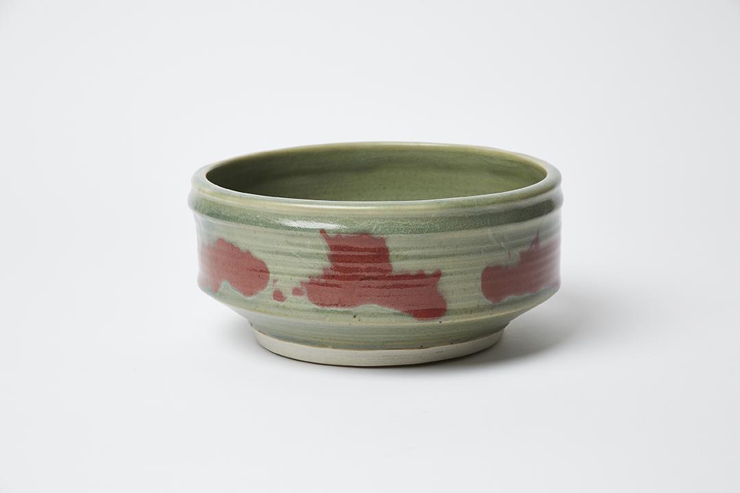 Otto Heino Green and Red Bowl: Bowl with green and red glaze by Otto Heino, 1998. Underside incised with Otto + 98.
