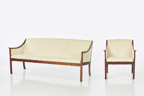 Ole Wanscher Rosewood Sofa and Armchair (2): Rosewood and fabric sofa and armchair by Ole Wanscher for P. Jeppesen Mobelfabrik, Denmark, ca. 1960. Each with manufacturer's sticker to underside. Chair: 30.5 x 26.25 x 26.5 in.