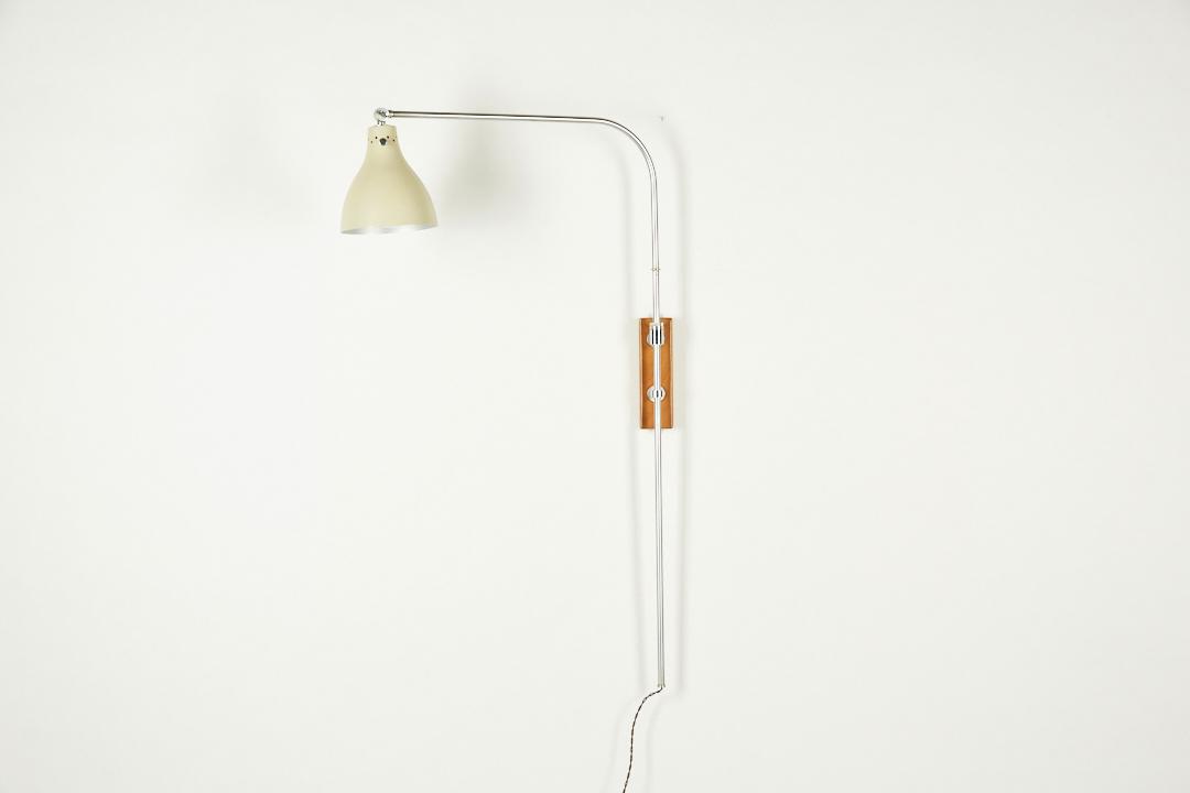 Greta Von Nessen, Swing-Arm Wall Lamp, Model No. NS 945: Greta Von Nessen Swing-arm wall lamp, model NS 945, ca. 1950 Brushed steel, maple, painted metal. Manufactured by Von Nessen Studio, USA.
