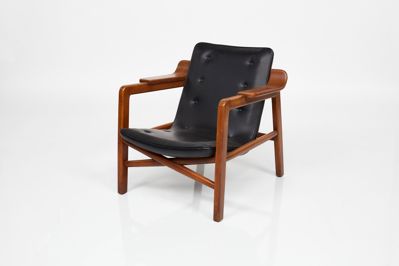 Edvard & Tove Kindt-Larsen, 'Fireside' Lounge Chair: Edvard & Tove Kindt-Larsen 'Fireside' lounge chair, 1950s Teak, vinyl. Manufactured by Gustav Bertelsen & Co., Denmark. 28" H x 27.25" W x 30" D