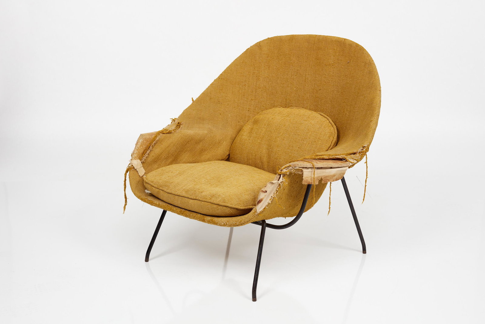 Eero Saarinen, 'Womb' Lounge Chair: Eero Saarinen 'Womb' lounge chair, 1960s Painted steel, fabric. Manufactured by Knoll, USA. 35.5" H x 39.75" W x 31" D