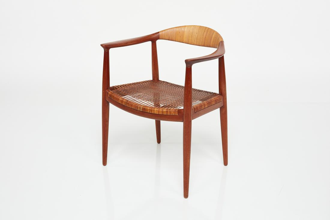 Hans Wegner, 'The' Chair, Model No. JH501: Hans Wegner 'The' chair, model no. JH501, ca. 1949 Teak, cane. Manufactured by Johannes Hansen, Denmark. Underside of seat with branded manufacturer's mark. 29.75" H x 24.75" D x 20" W