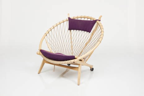 Hans J. Wegner, 'Hoop' Chair, Model No. PP130: Hans J. Wegner Hoop' chair, model no. PP130, 2000 Ash, flagline, fabric, casters. Manufactured by PP Mobler, Denmark. Underside branded with manufacturer's mark, designer name and year. 39" H x 44" W