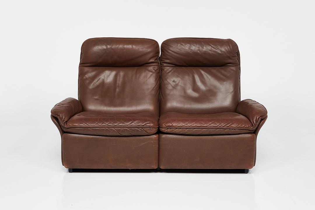 De Sede, Settee: De Sede Settee, 1970s Leather. Manufactured by de Sede, Switzerland. Underside of cushions with manufacturer's branded decking. 34" H x 58" W x 32" D