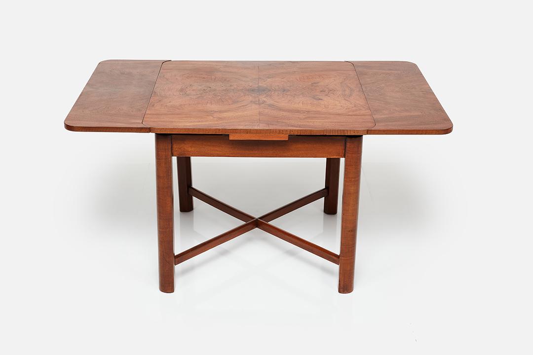 Gilbert Rohde (Attrib.), Dining Table: Gilbert Rohde (Attrib.) Extension dining table, 1930s Paldao. 30.5" H x 36" W x 36" D With leaves fully extended: 60" W