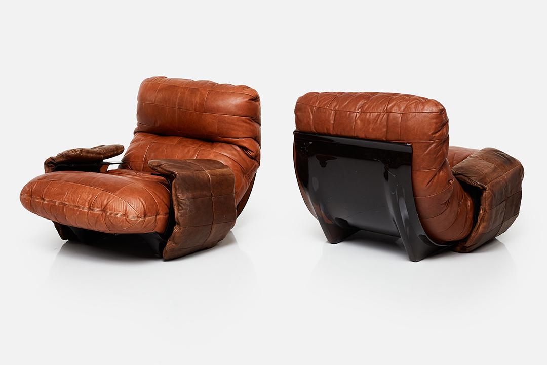 Michel Ducaroy, 'Marsala' Lounge Chairs (2): Michel Ducaroy Pair of 'Marsala' lounge chairs, 1969 Smoked acrylic, leather. Manufactured by Ligne Roset, France. Each shell with manufacturer's decal. Each seat cushion with branded decking. One sea
