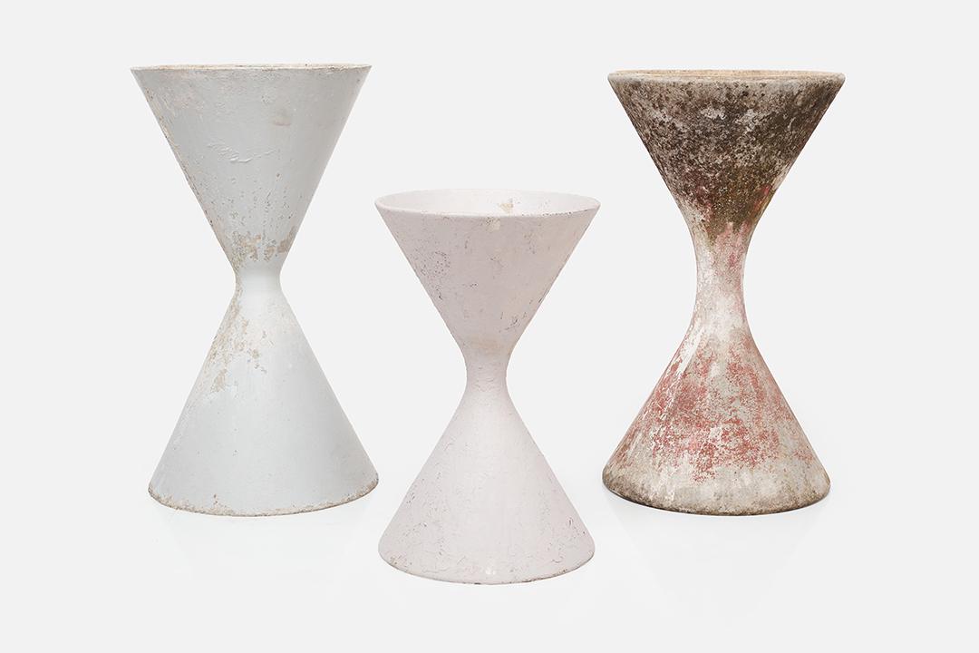 Willy Guhl, 'Diabolo' Planters (3): Willy Guhl Set of 'Diabolo' planters, 1960s Fibrated concrete. Manufactured by Eternit, Switzerland. Lot comprising one small and two large 'Diabolo' planters. Each large: 32" H x 18" Diameter Small: 