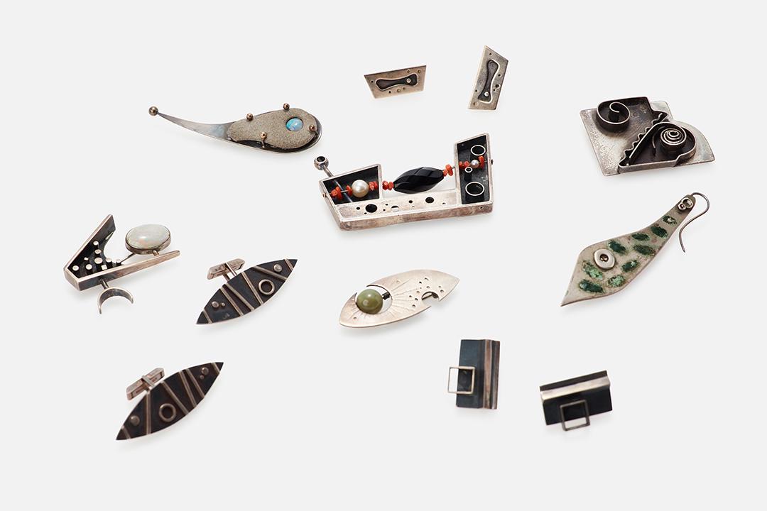 Don Paul Roberts, Jewelry Suite (9): Don Paul Roberts Jewelry suite, 1950s Sterling silver, black onyx, opal, jade, vermillion wood. Studio-made in San Francisco, CA. Lot comprising six brooches, two pairs of clip-on earrings and one pai