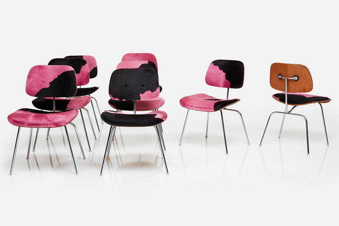 Charles & Ray Eames, Slunk Skin 'DCM' Chairs (8): Charles & Ray Eames Set of eight 'DCM' chairs, 1960s Slunk skin, molded plywood, chrome-plated steel. Manufactured by Herman Miller, USA. Each with manufacturer's label. Each: 29.5" H x 19.5" W x 22"