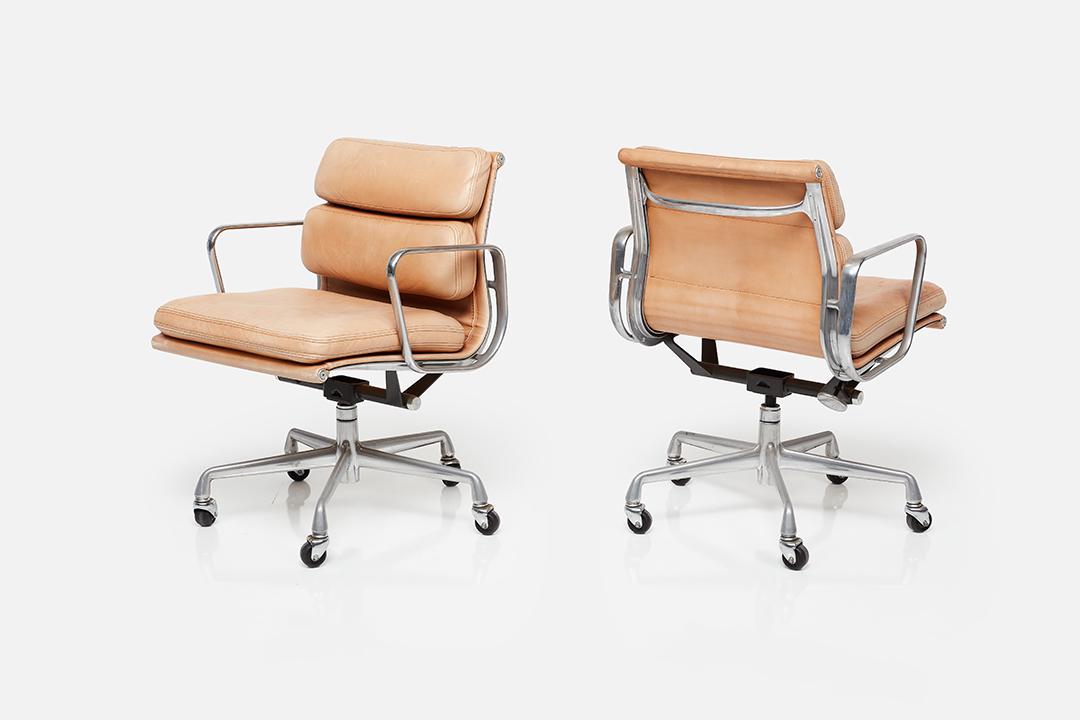 Charles & Ray Eames, Aluminum Group 'Soft Pad' Chairs (2): Charles & Ray Eames Pair of Aluminum Group 'Soft Pad' chairs with swivel and tilt mechanism, 1970s Natural finished leather, aluminum. Manufactured by Herman Miller, USA. Undersides molded with manufa