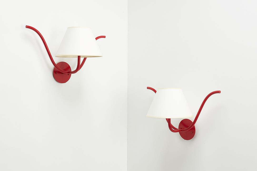 After Jean Royère, 'Ondulation I' Sconces (2): After Jean Royère Pair of 'Ondulation I' single-arm sconces, 21st Century Powder-coated forged iron, parchment paper. Produced by Edition Modern, Los Angeles, CA. Each: 9" H x 17" W x 9" D