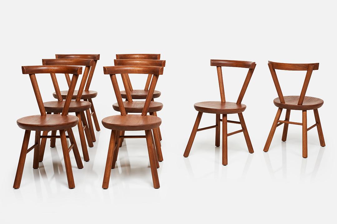 Charlotte Perriand Style, Sculptural Dining Chairs (8): Charlotte Perriand Style Set of eight dining chairs, 1970s Mahogany. Each: 31" H x 16.75" W x 20.5" D