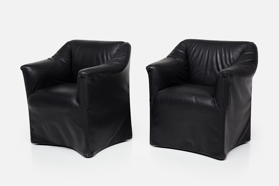 Mario Bellini, 'Piccola Tentazione' Armchairs (2): Mario Bellini Pair of 'Piccola Tentazione' armchairs, 1970s Leather, steel. Manufactured by Cassina, Italy. Underside with manufacturer and distributor's label. 32.5" H x 31" W x 24" D Seat height: 19