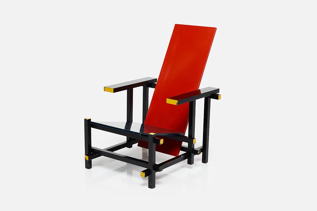 After Gerrit Rietveld, 'Red Blue' Chair: After Gerrit Rietveld Red Blue' chair, 1980s Lacquered wood. 34.5" H x 25.75" W x 31" D Seat height: 13"