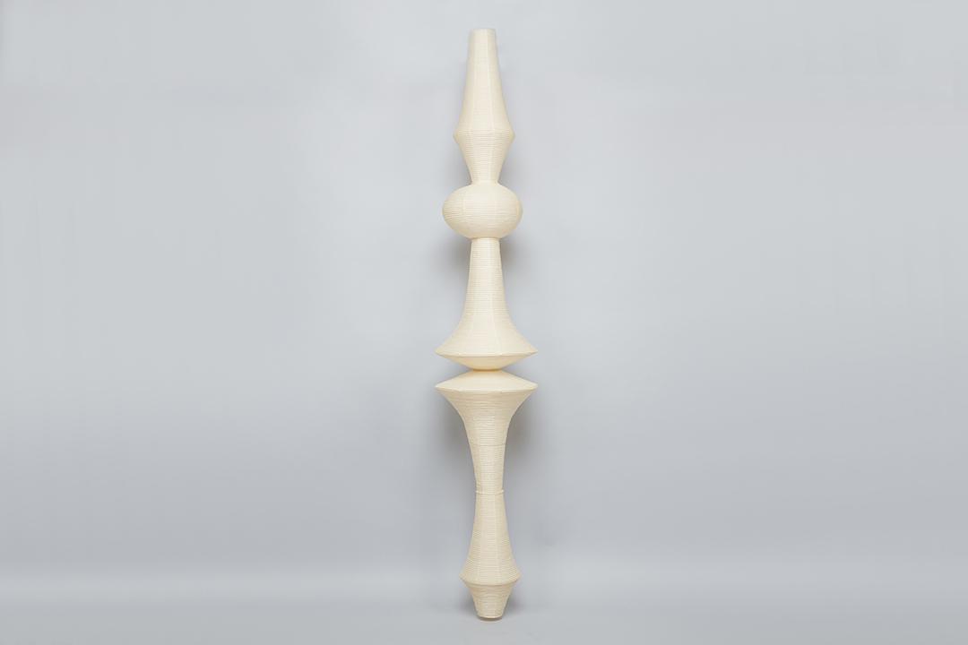 Isamu Noguchi, Akari Hanging Light Sculpture: Isamu Noguchi Akari hanging light sculpture, model E, 21st Century Washi paper, bamboo. Manufactured by Ozeki & Co., Ltd., Japan. Signed near the bottom. 116" H x 18.75" Diameter