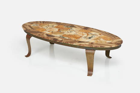 Arturo Pani, Coffee Table: ARTURO PANIOval coffee table, 1960sOnyx, agate, gilt bronze. Manufactured by Guy Mueller, Mexico.Underside with manufacturer&#39;s label.14&quot; H x 58&quot; W x 26.5&quot; D