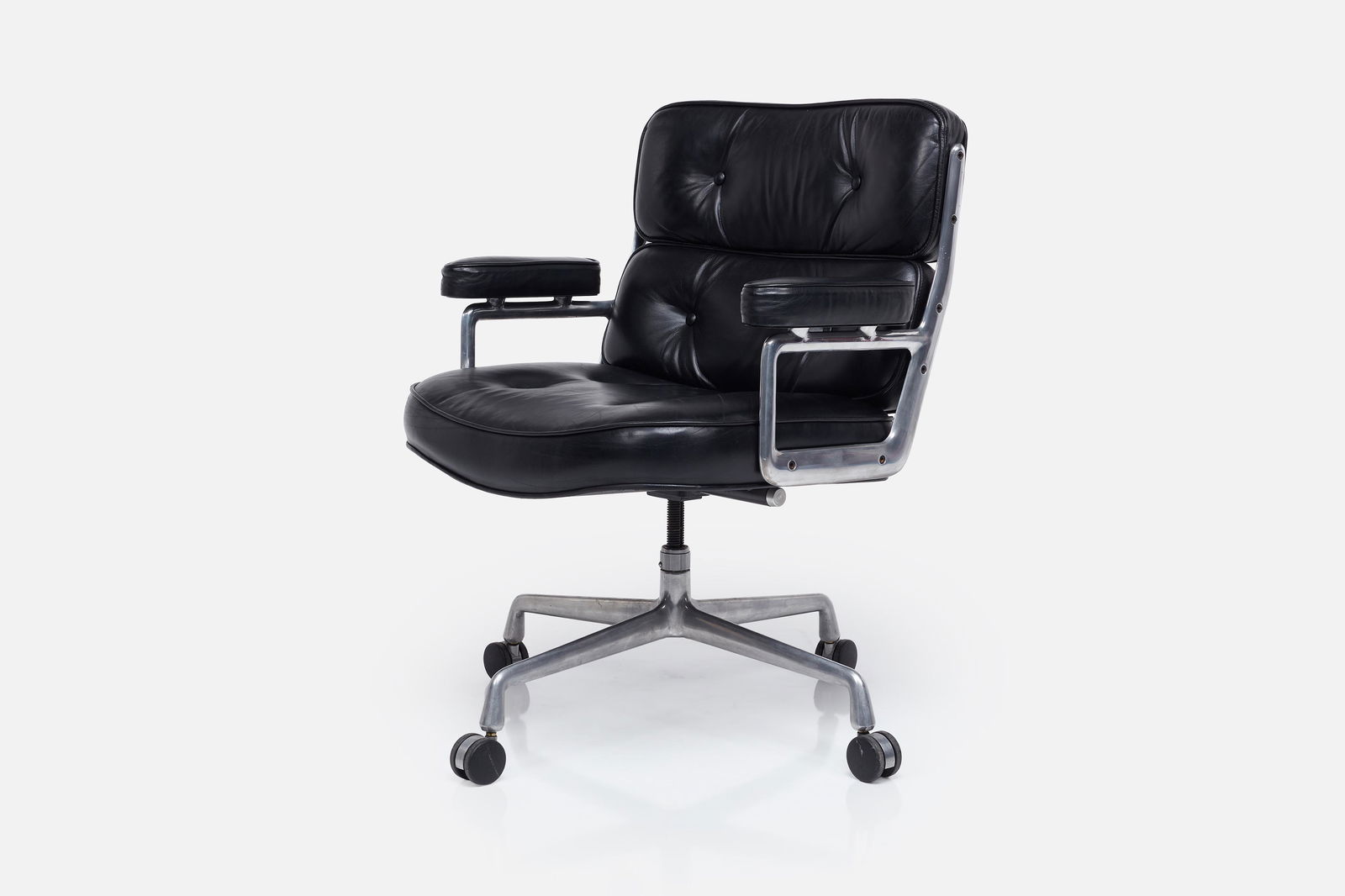 Charles + Ray Eames, 'Time Life' Executive Chair: CHARLES + RAY EAMES'Time Life' lobby chair, 1986Leather, aluminum, steel. Manufactured by Herman Miller, USA.Underside stamped "APR 16 1986." 33" - 36.25" H x 26.