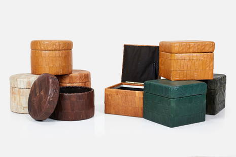 de Sede, Storage Ottomans (8): DE SEDESet of eight storage ottomans, 1970sPatchwork leather over wood, fabric. Manufactured by De Sede, Switzerland. Each approximately: 13" H x 16" W x 16" D