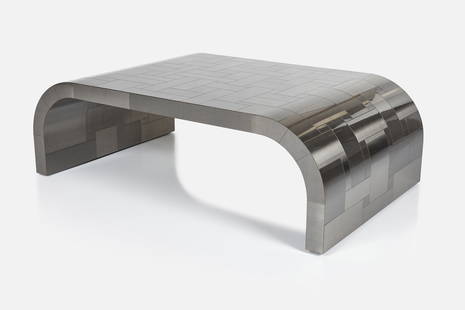 Paul Evans, 'Cityscape' Coffee Table: PAUL EVANS'Cityscape' coffee table, 1970sBrushed and polished metal over wood. Produced by Paul Evans Studio for Directional, USA.Underside of foot with stamped signature. 17.25" H x 54.5