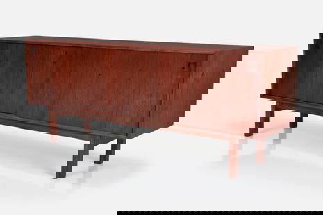 Gunni Omann, Credenza: GUNNI OMANNCredenza, 1960sRosewood-veneered wood, rosewood. Manufactured by Omann Jun, Denmark. 31" H x 79" W x 18.75" D