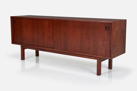 Gunni Omann, Credenza: GUNNI OMANNCredenza, 1960sRosewood-veneered wood, rosewood. Manufactured by Omann Jun, Denmark. 31&quot; H x 79&quot; W x 18.75&quot; D