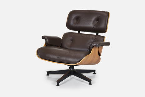 Charles + Ray Eames, Lounge Chair: CHARLES + RAY EAMESLounge chair, model nos. 670, 2000sWalnut-veneered plywood, leather, enameled and brushed aluminum. Manufactured by Herman Miller, USA.Underside with manufacturer's label.33.25&