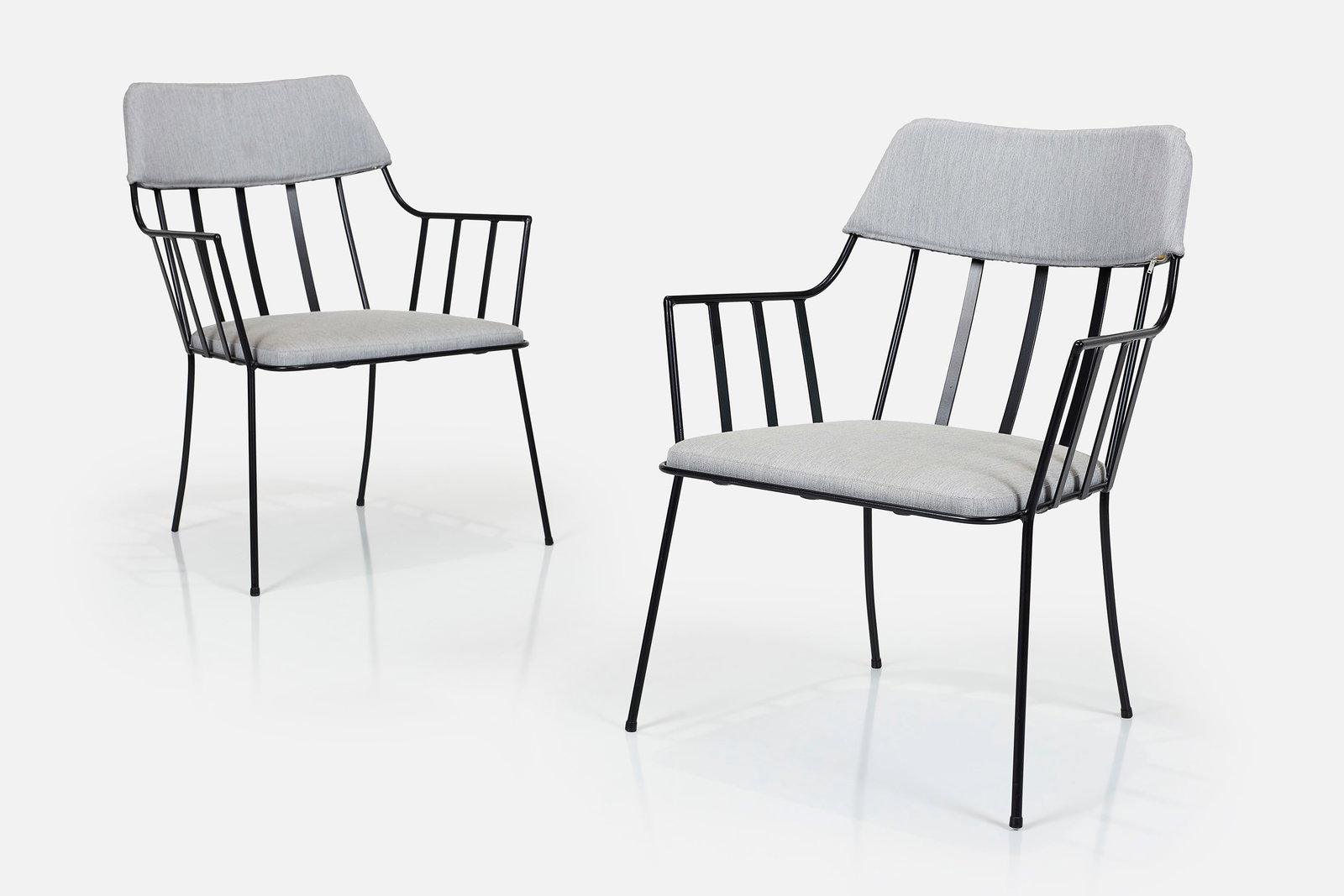 Paul Laszlo, Armchairs (2): PAUL LASZLOPair of armchairs, 1950sPainted iron, fabric. Manufactured by Pacific Iron, USA Each: 31.75" H x 25" W x 23" DSeat height: 16"