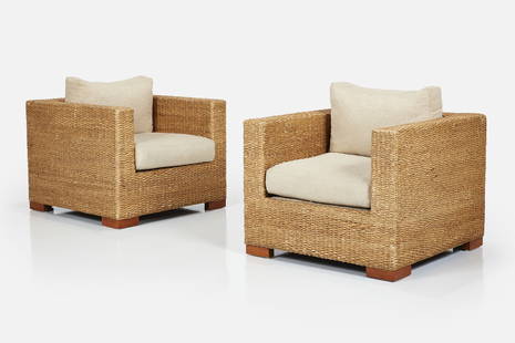 Adrien Audoux + Frida Minet Style, Club Chairs (2): ADRIEN ADOUX + FRIDA MINET STYLEPair of club chairs, late-20th centuryWoven sea grass, fabric, wood. Each: 33" H x 34.5" W x 35" DSeat height: 18"