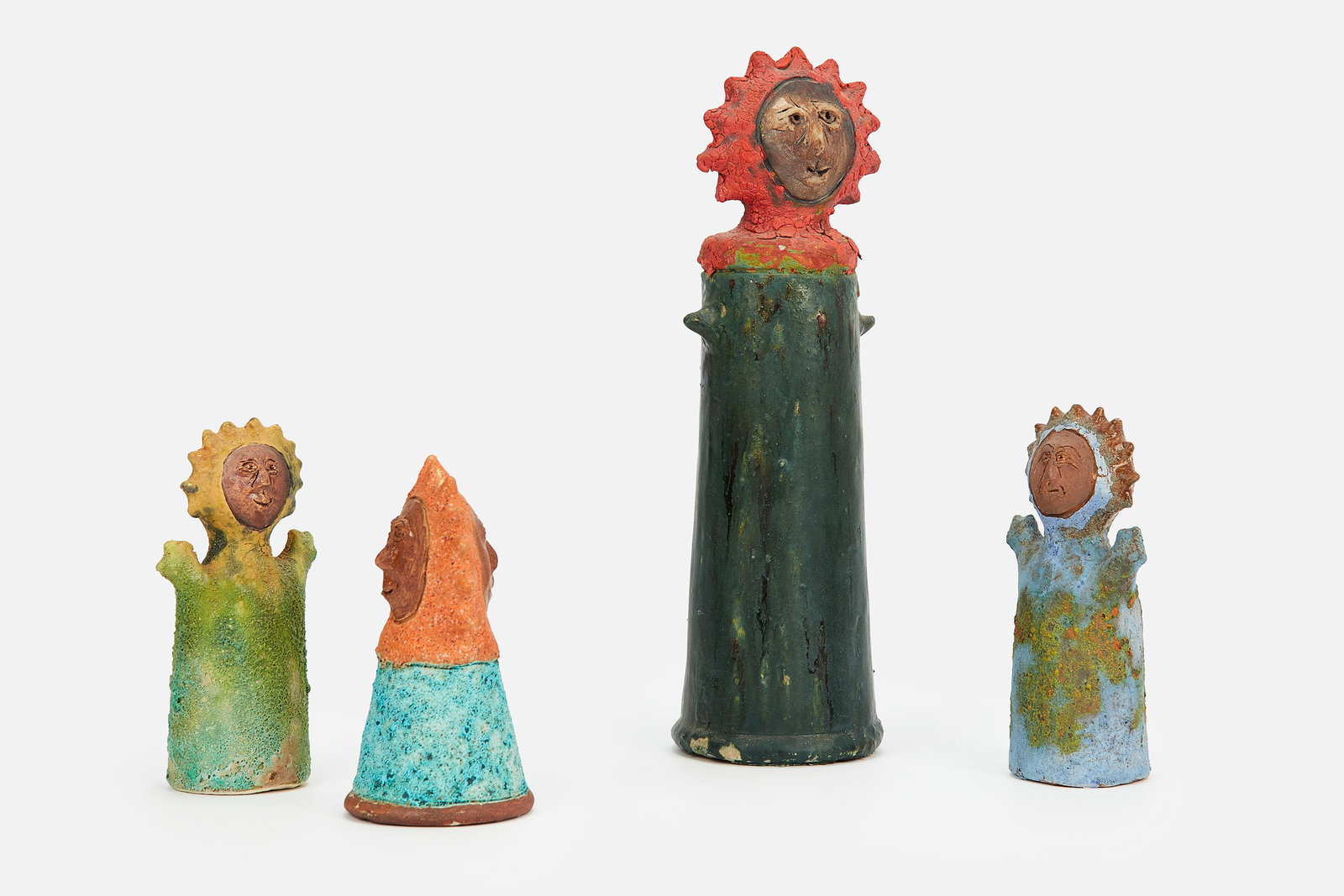 Stan Bitters, 'Sun Person' Sculptures (4): STAN BITTERSSet of four 'Sun Person' sculpturesGlazed ceramic. Studio-made in California. Tallest: 17" H x 5.75" DiameterShortest: 8.25" H x 4.25" Diameter
