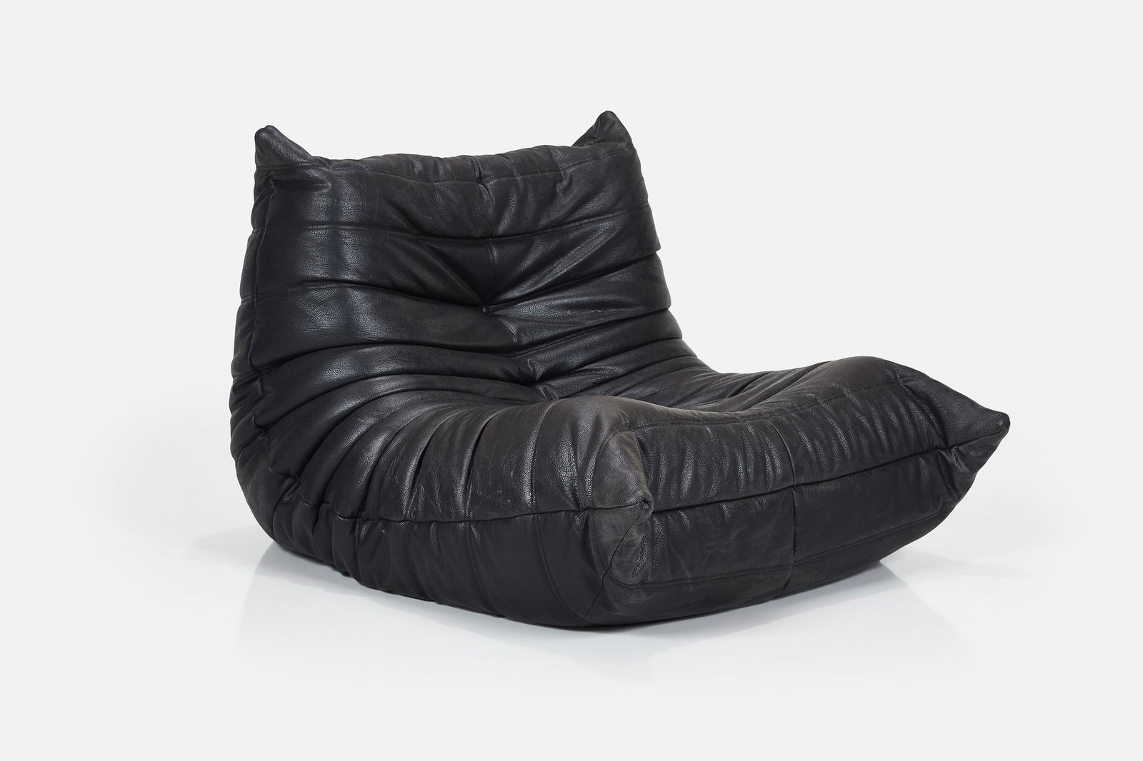 Michel Ducaroy, 'Togo' Lounge Chair: MICHEL DUCAROY'Togo' chair, 1989Faux leather, foam. Manufactured by Ligne Roset., France. Underside with manufacturer's branded decking and back seam with fabric tag. 29&