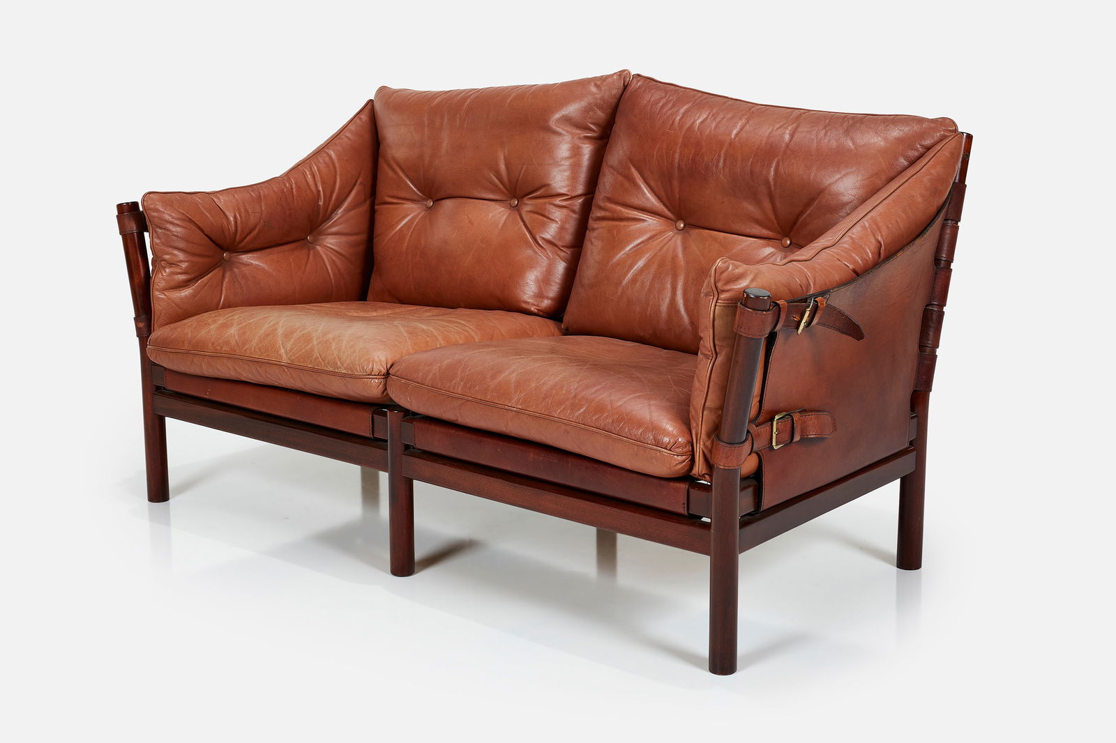 Arne Norell, 'Ilona' Settee: ARNE NORELL'Ilona' settee, ca. 1971Leather, rosewood, fabric, brass. Manufactured by Norrel Mobel AB, Sweden. 31" H x 60" W x 31" DSeat Height: 17"