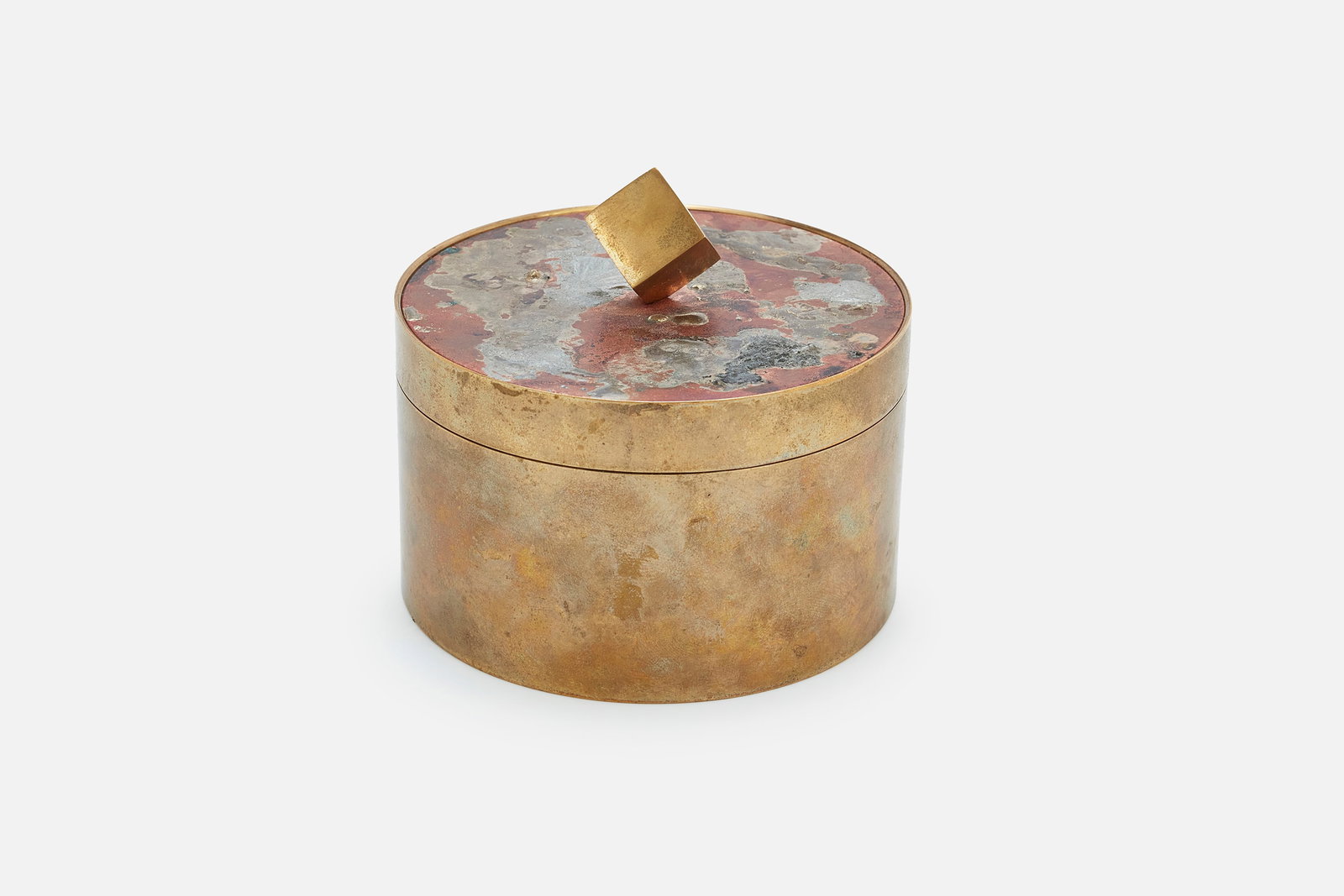 Pierre Forssell, Lidded Box: PIERRE FORSSELLLidded box, model no. 1607, ca. 1965Brass, mixed metals. Manufactured by Skultuna, Sweden.Underside impressed with model number and manufacturer's mark. 3.5" H x 4"