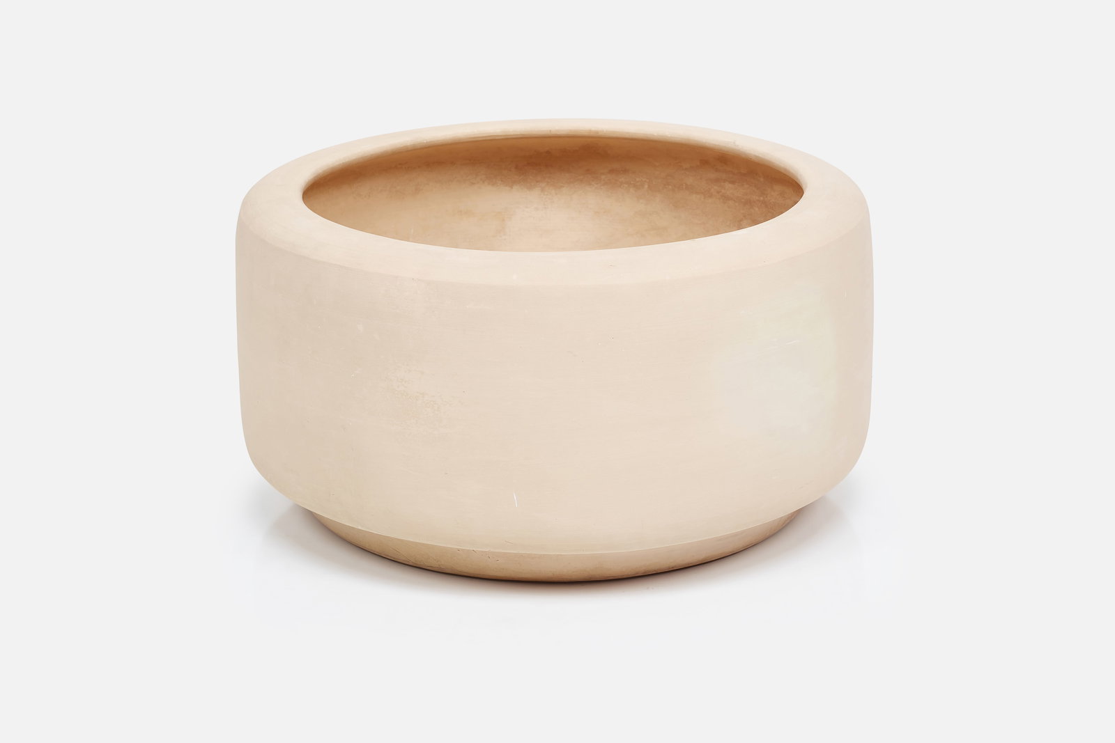 John Follis, Large 'Tire' Planter: JOHN FOLLIS 'Tire' planter, model no. CP-25, 1960s Bisque-glazed earthenware. Manufactured by Architectural Pottery, USA. 13" H x 25" Diameter